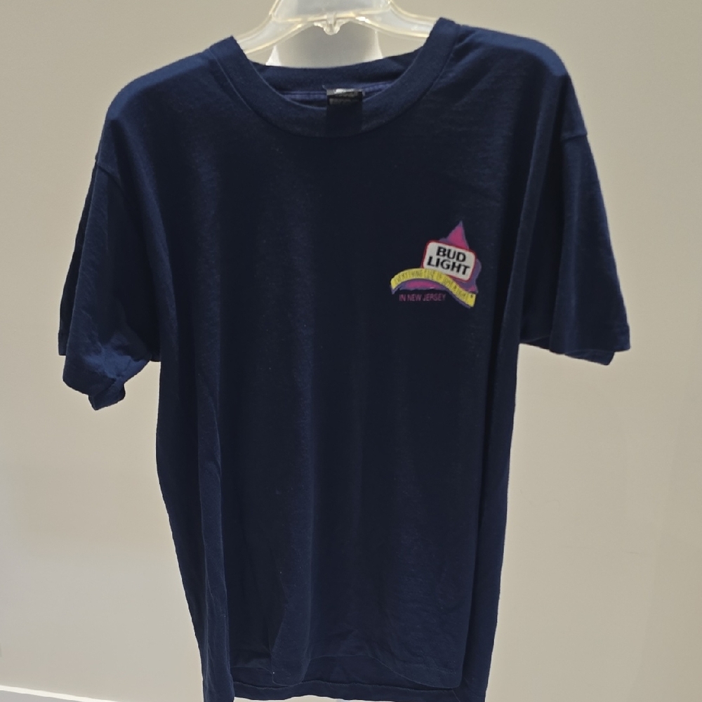 Vintage Uni Sex Navy Blue Graphic T-Shirt. I would Suggest It Is A Women's XL